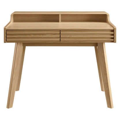 Natural oak wood desk with an elevated top shelf, two shallow drawers, and angled legs; mid-century modern writing/office desk.