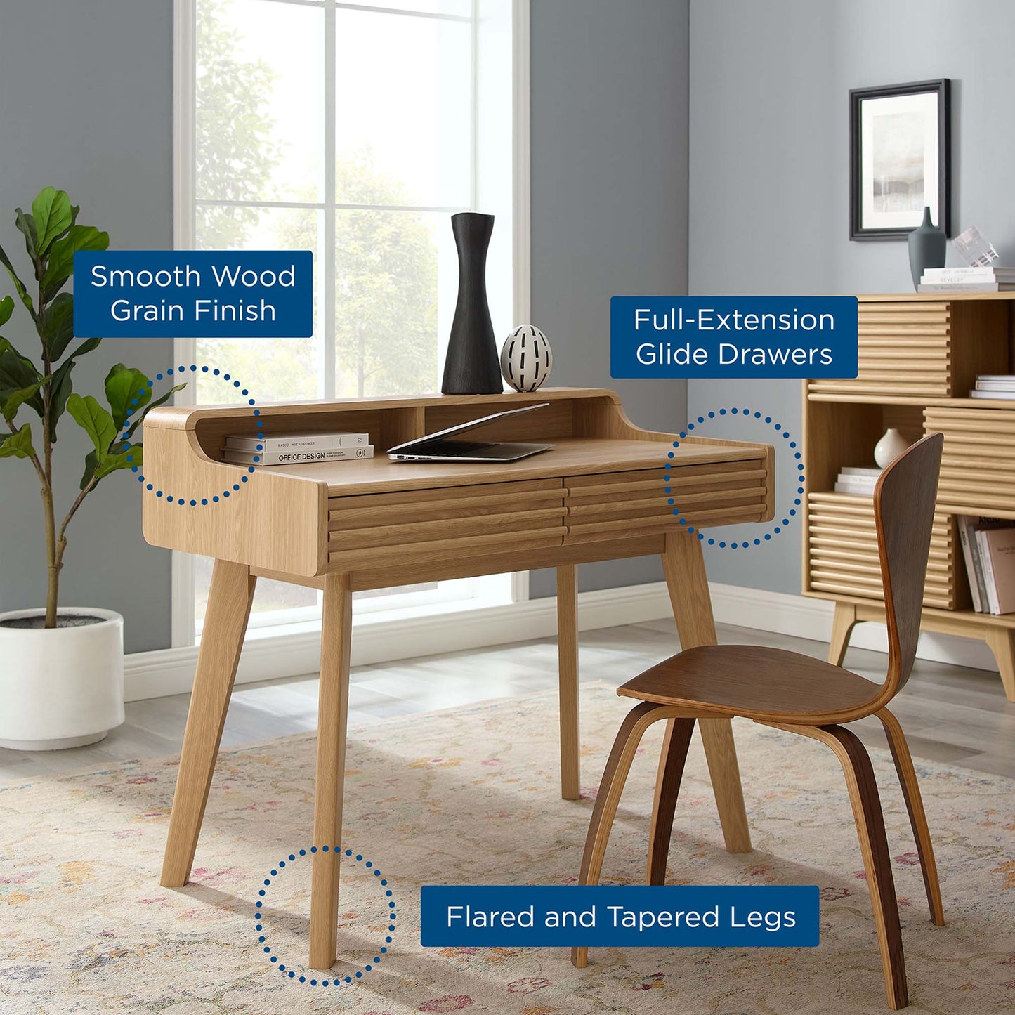 Oak wood desk with smooth grain finish, full-extension drawers, and flared tapered legs.
