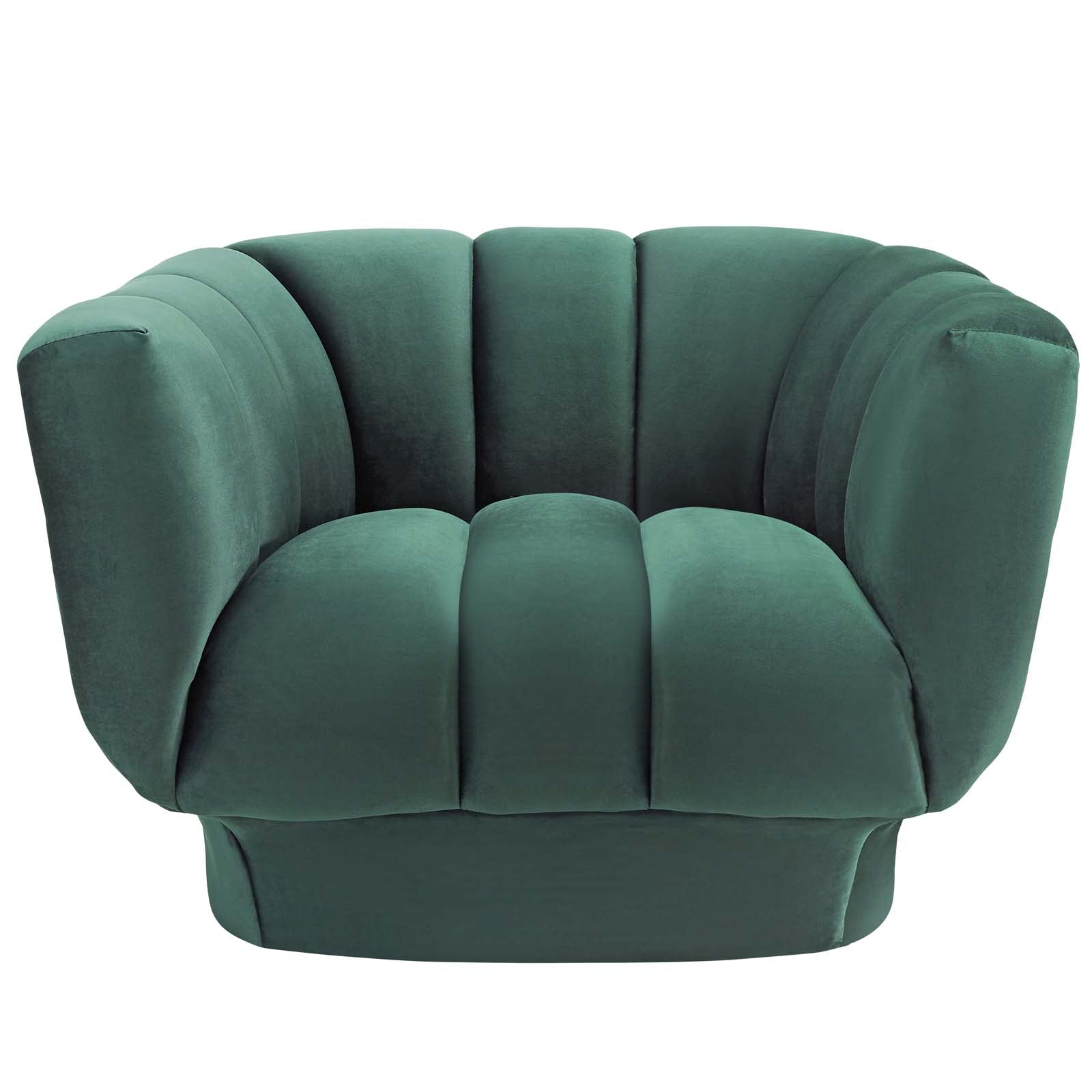 Green velvet curved barrel chair with plush segmented cushions and rounded arms.