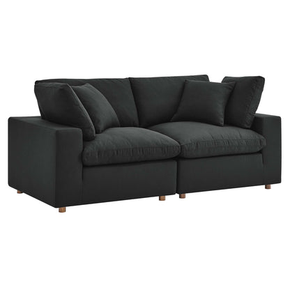 Charcoal black fabric sectional sofa set with two-seat cushions, back pillows, and wooden legs.