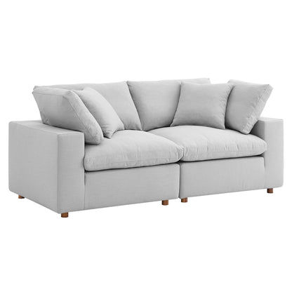 Light gray fabric sectional sofa set with plush cushions, square arms, and small wooden feet for a modern living room look.
