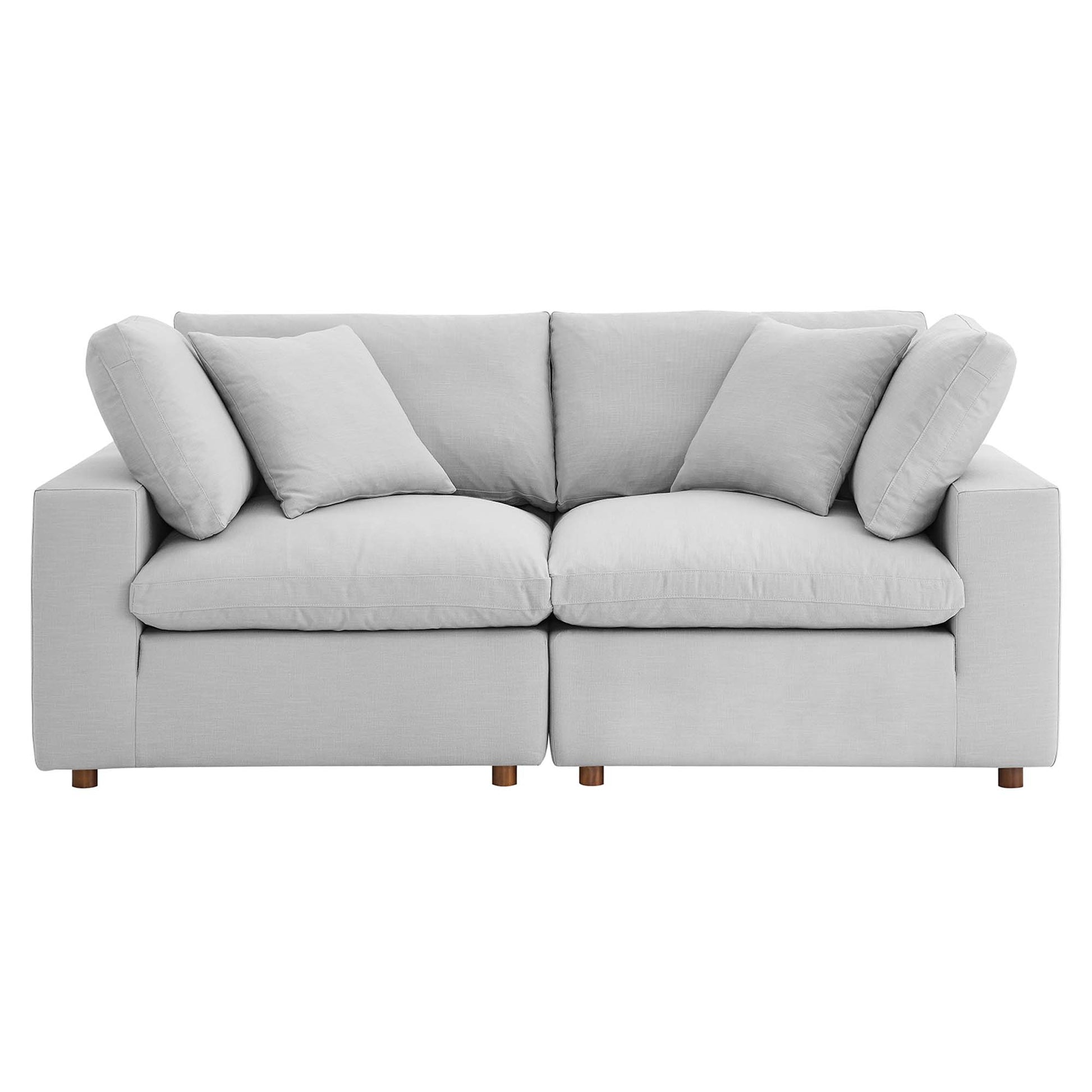 Light gray fabric 2-piece sectional sofa set with loose back cushions, two matching throw pillows, and short wooden legs.