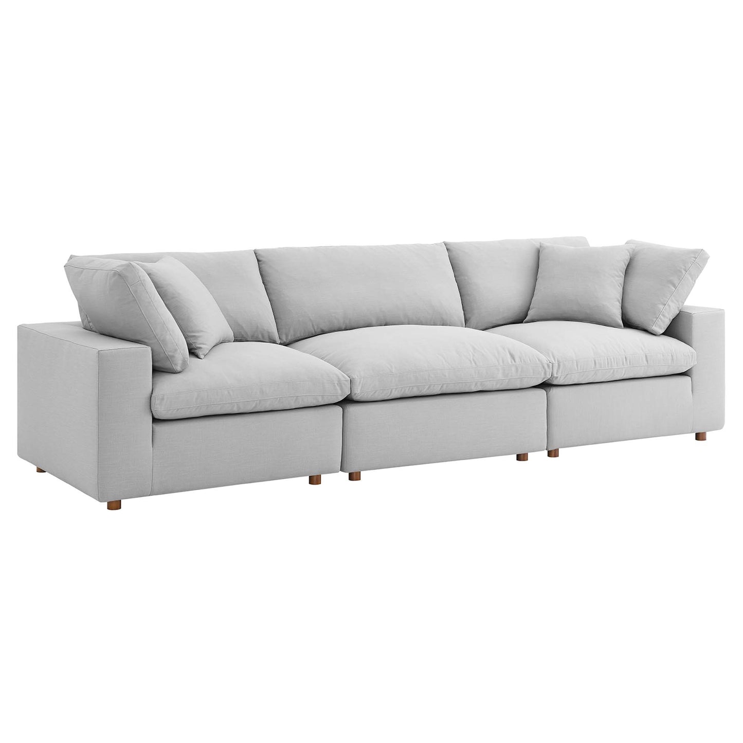Light gray fabric sectional sofa set with three sections, overstuffed back cushions, square arms, and short wooden legs.