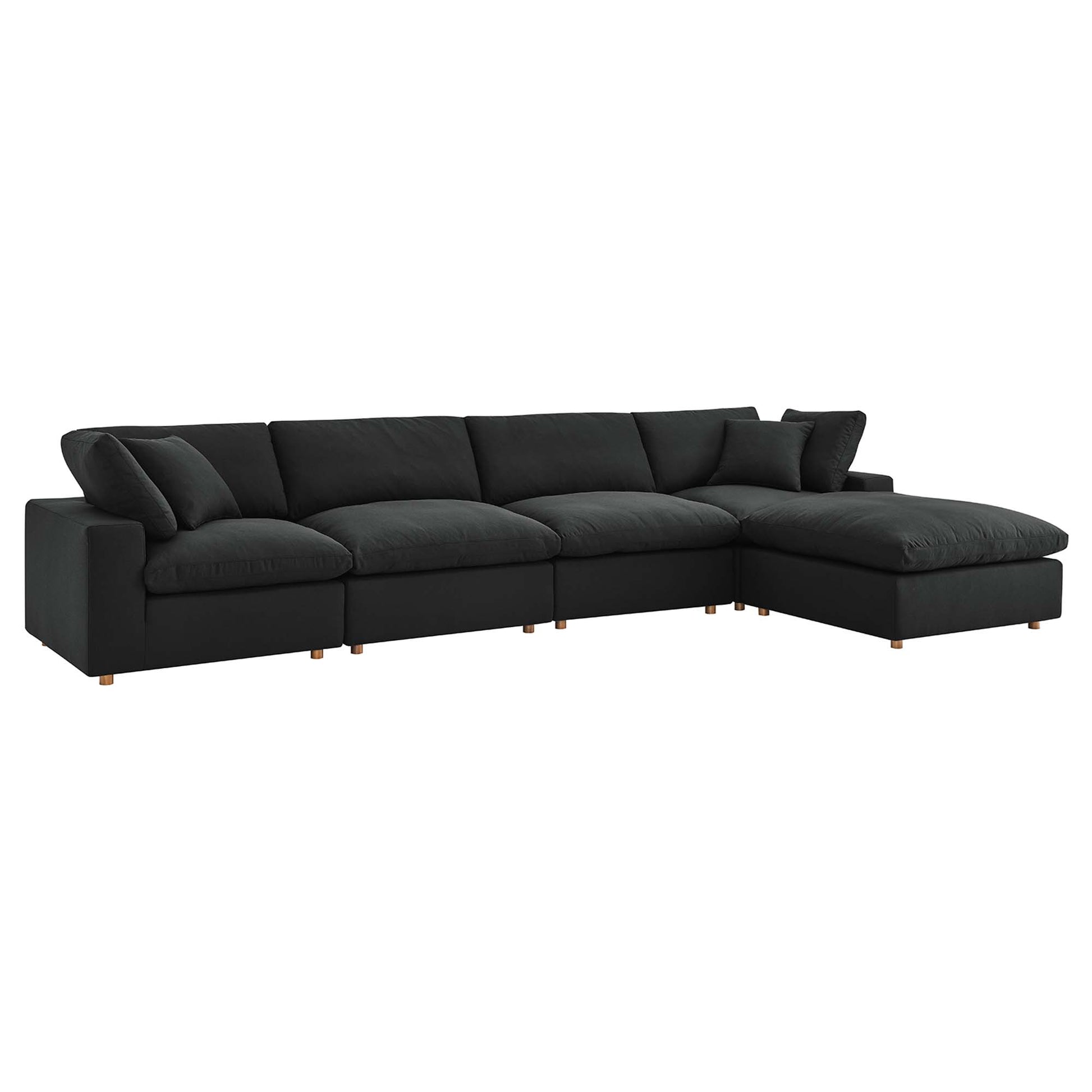 Charcoal fabric sectional sofa with right-side chaise, plush cushions, and light wood legs.