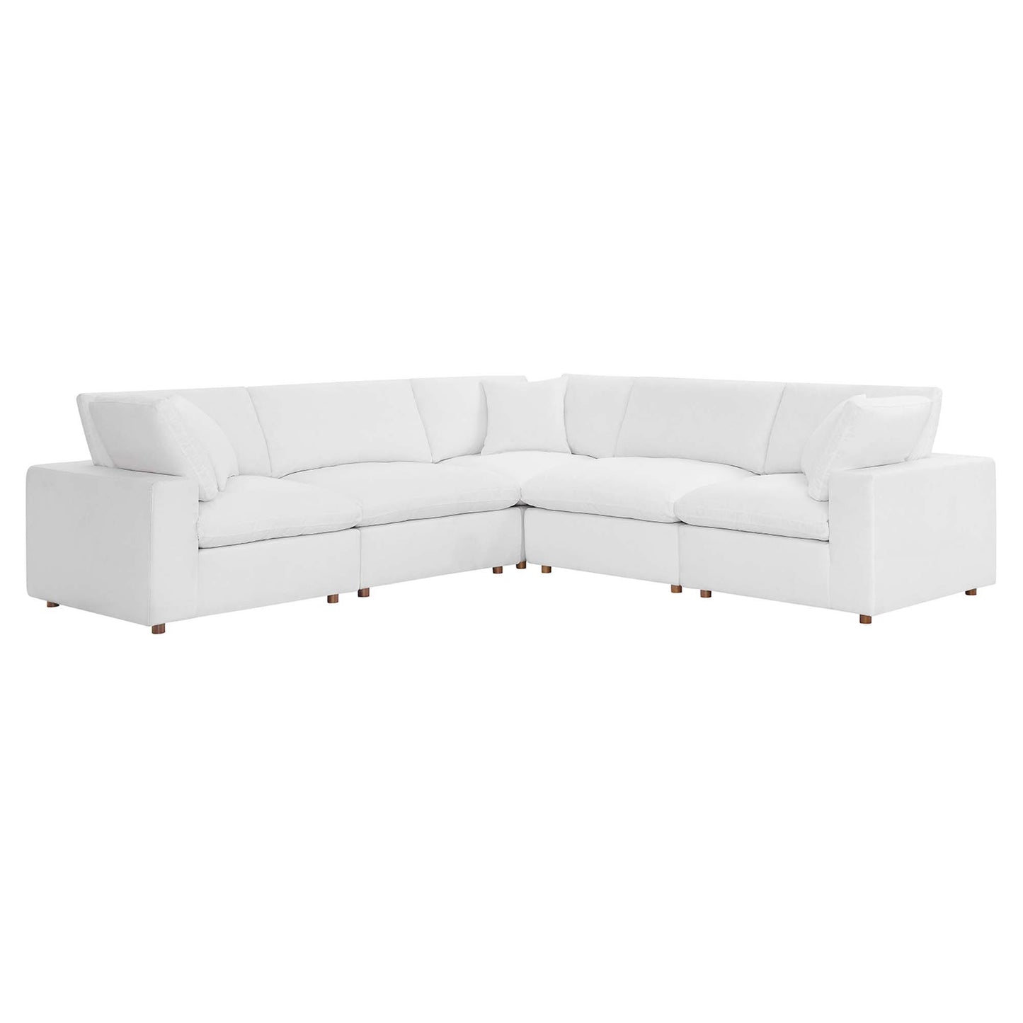White fabric L-shaped sectional sofa with deep cushions and wooden block feet, modern living room seating.