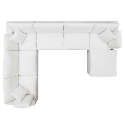 White fabric L-shaped sectional sofa with multiple cushions and chaise, modern cozy seating