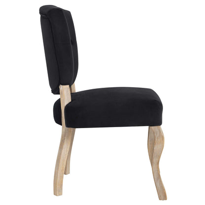 Side view of black upholstered dining chair with padded tall back and seat, light wood curved legs.