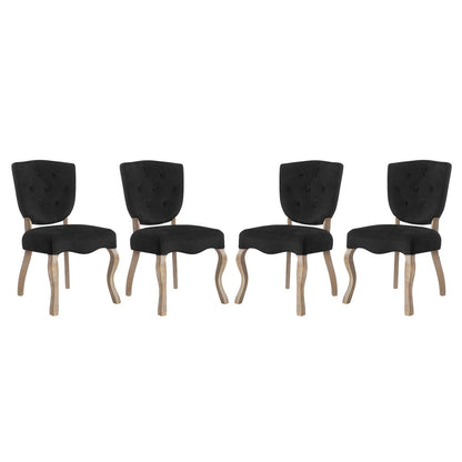 Set of four black tufted dining chairs with light wood curved legs and cushioned seats.