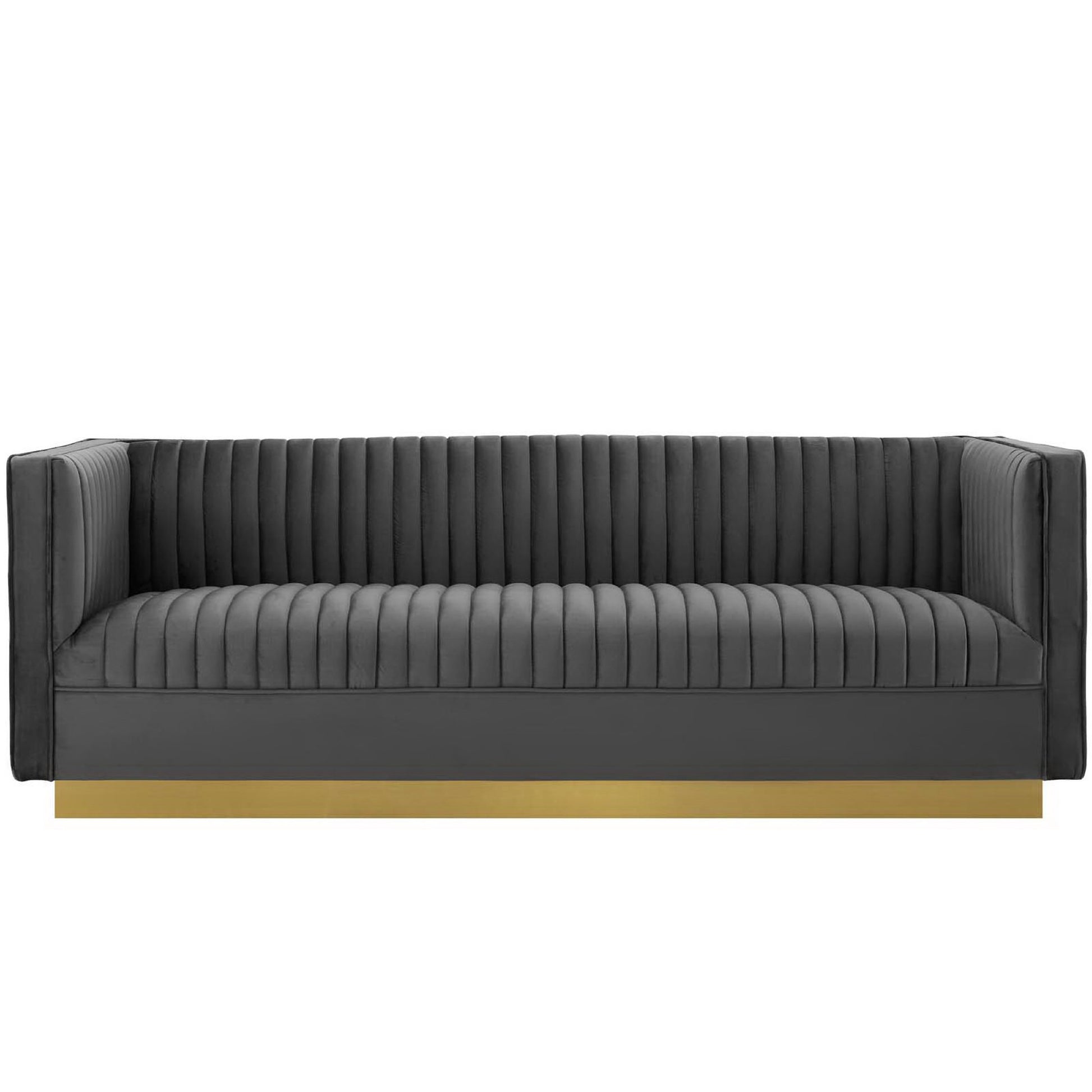 Grey performance velvet sofa with vertical channel tufting and low arms.