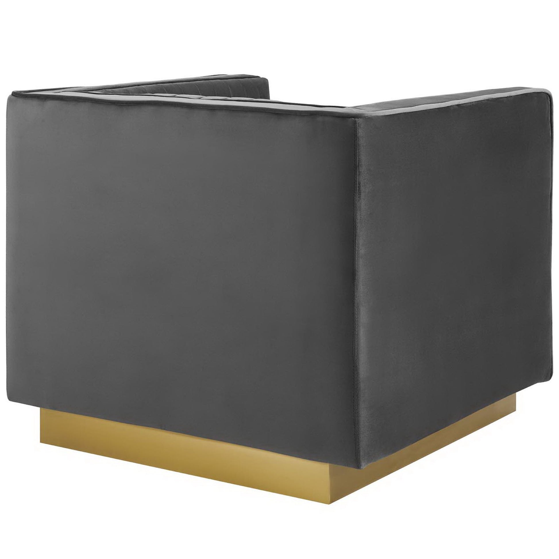 Gray velvet accent armchair with vertical channel tufting.