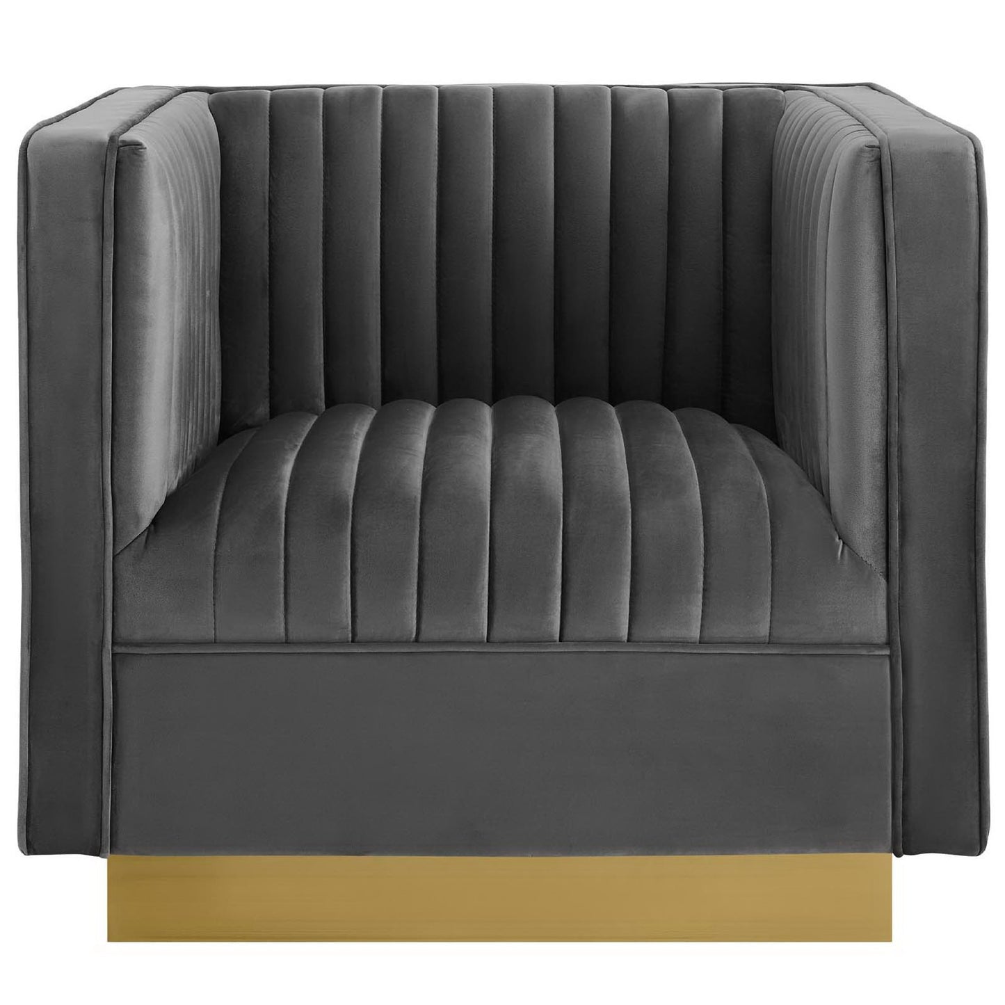 Dark gray velvet armchair with vertical channel tufting, square arms, and a gold-tone metal base.