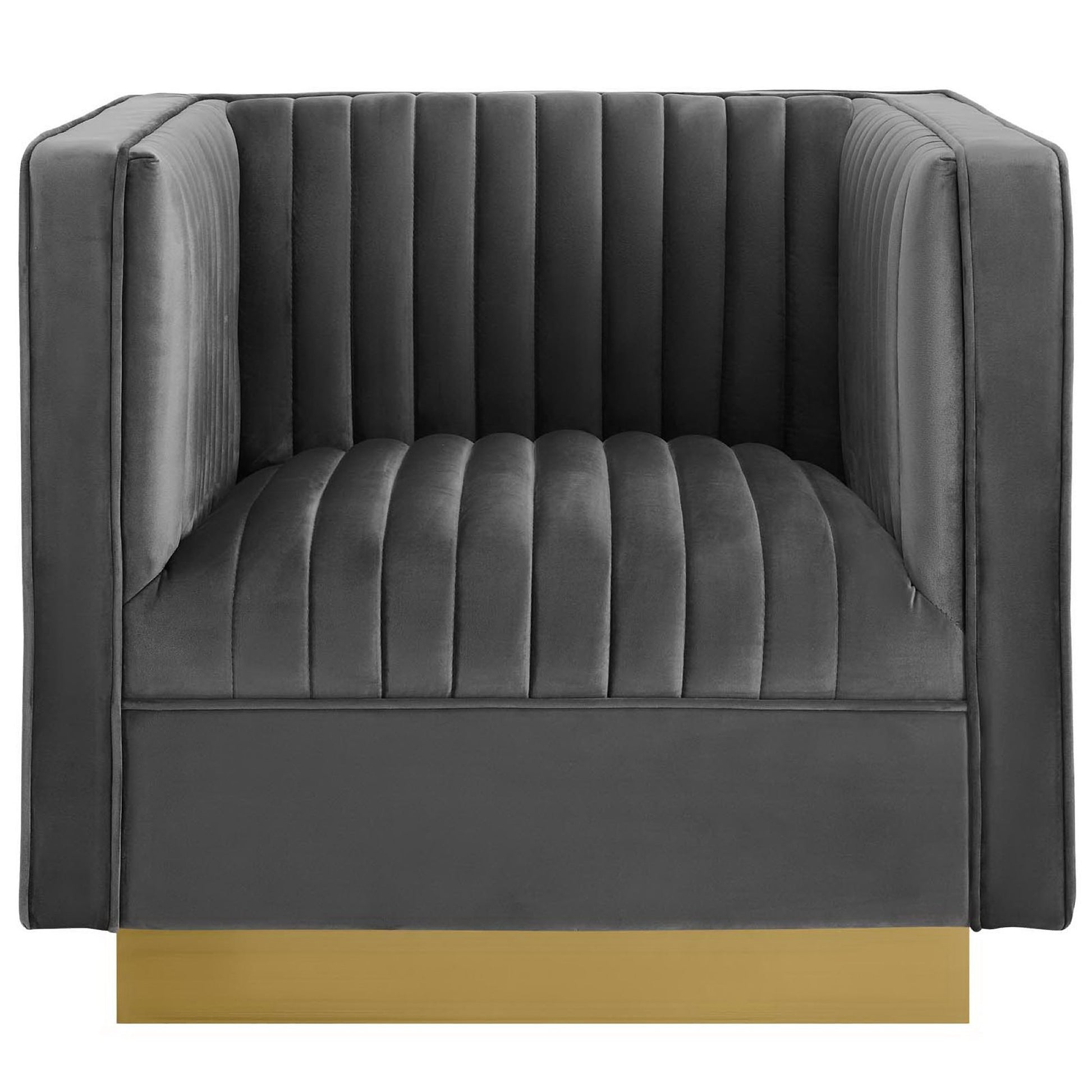 Dark gray velvet armchair with vertical channel tufting, square arms, and a gold-tone metal base.