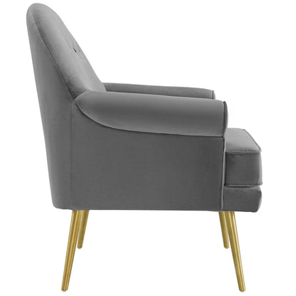 Gray velvet accent armchair with tufted button detailing, curved back & arms, gold tapered legs, mid-century modern style.