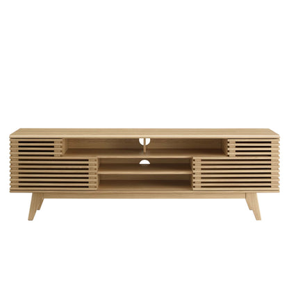Oak wood media console TV stand with slatted side panels, open central shelves, cable holes, and angled mid-century legs.