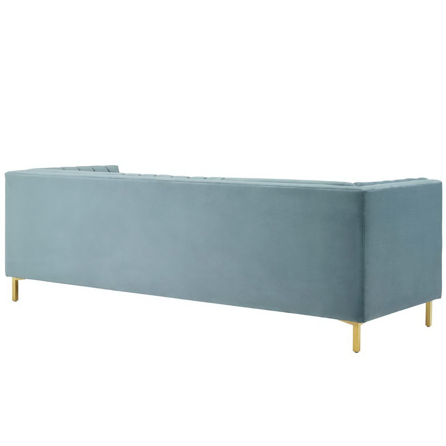 Blue velvet sofa with tufted back, low-profile design & gold legs.