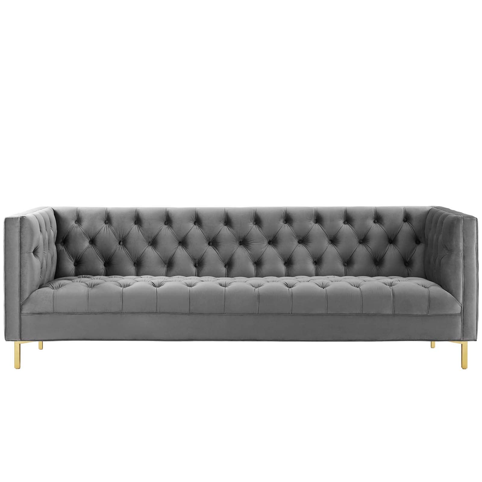 Grey tufted velvet sofa with buttoned back, gold legs; Chesterfield-inspired modern living room seating.