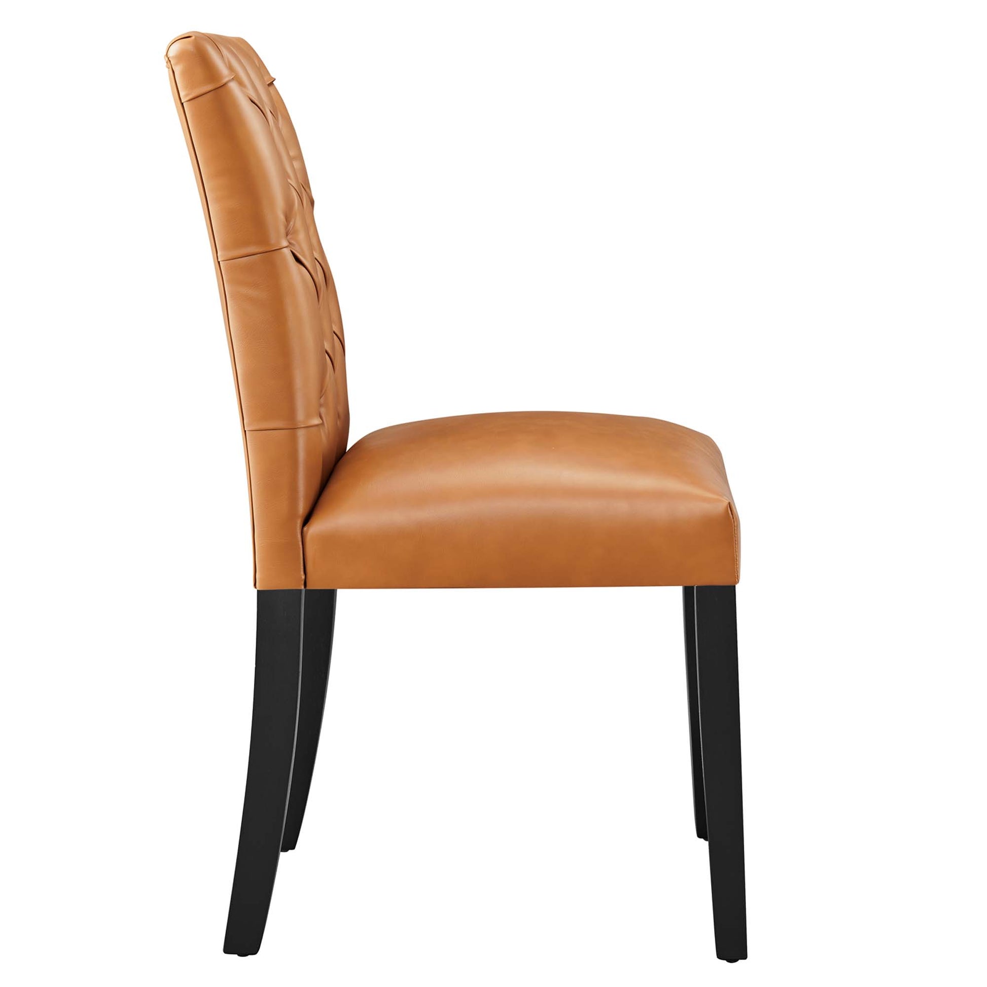 Tan vinyl dining chair, high padded back with tufted detailing, black wooden legs, side profile.