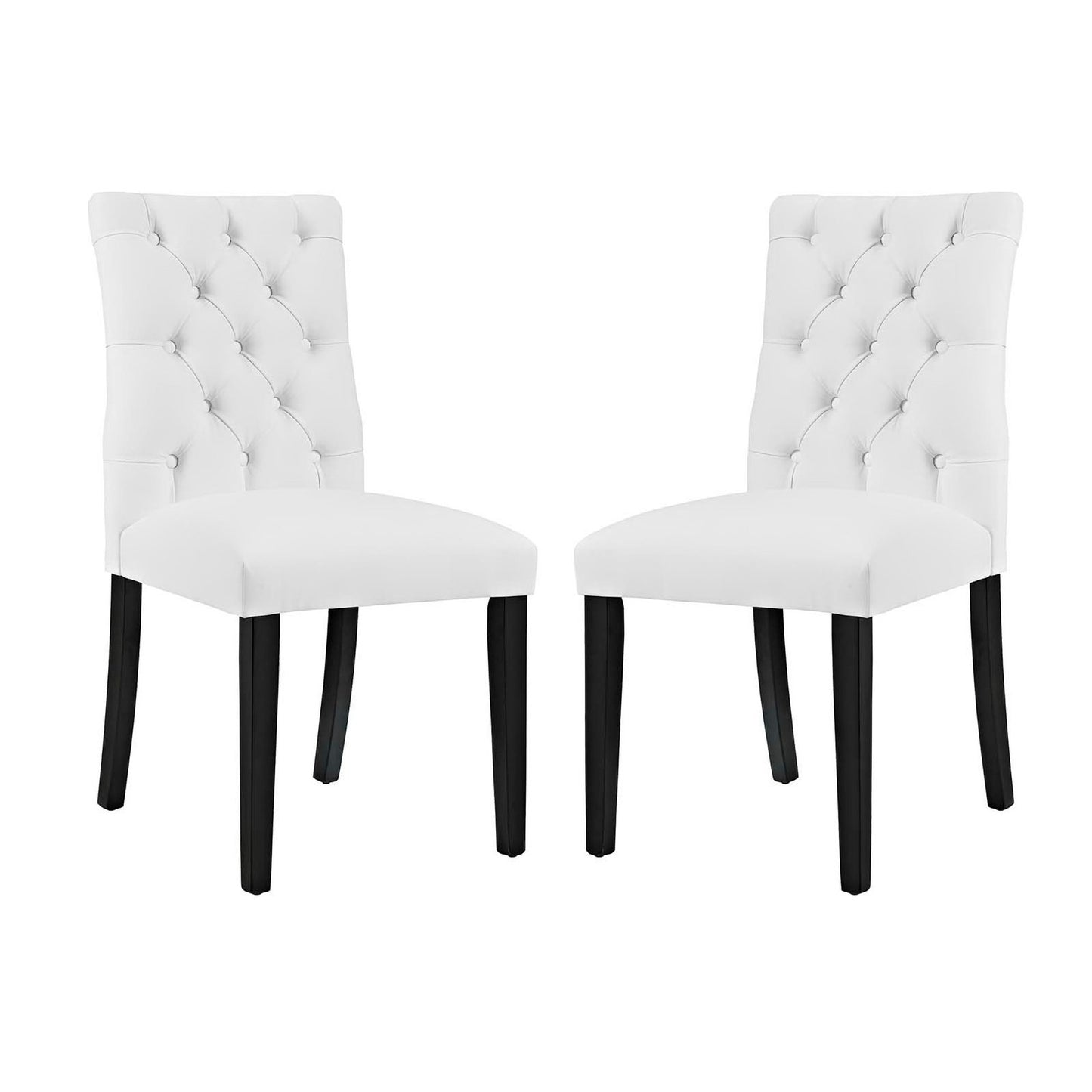 Pair of white tufted dining chairs with diamond-tufted backs and dark wood legs.