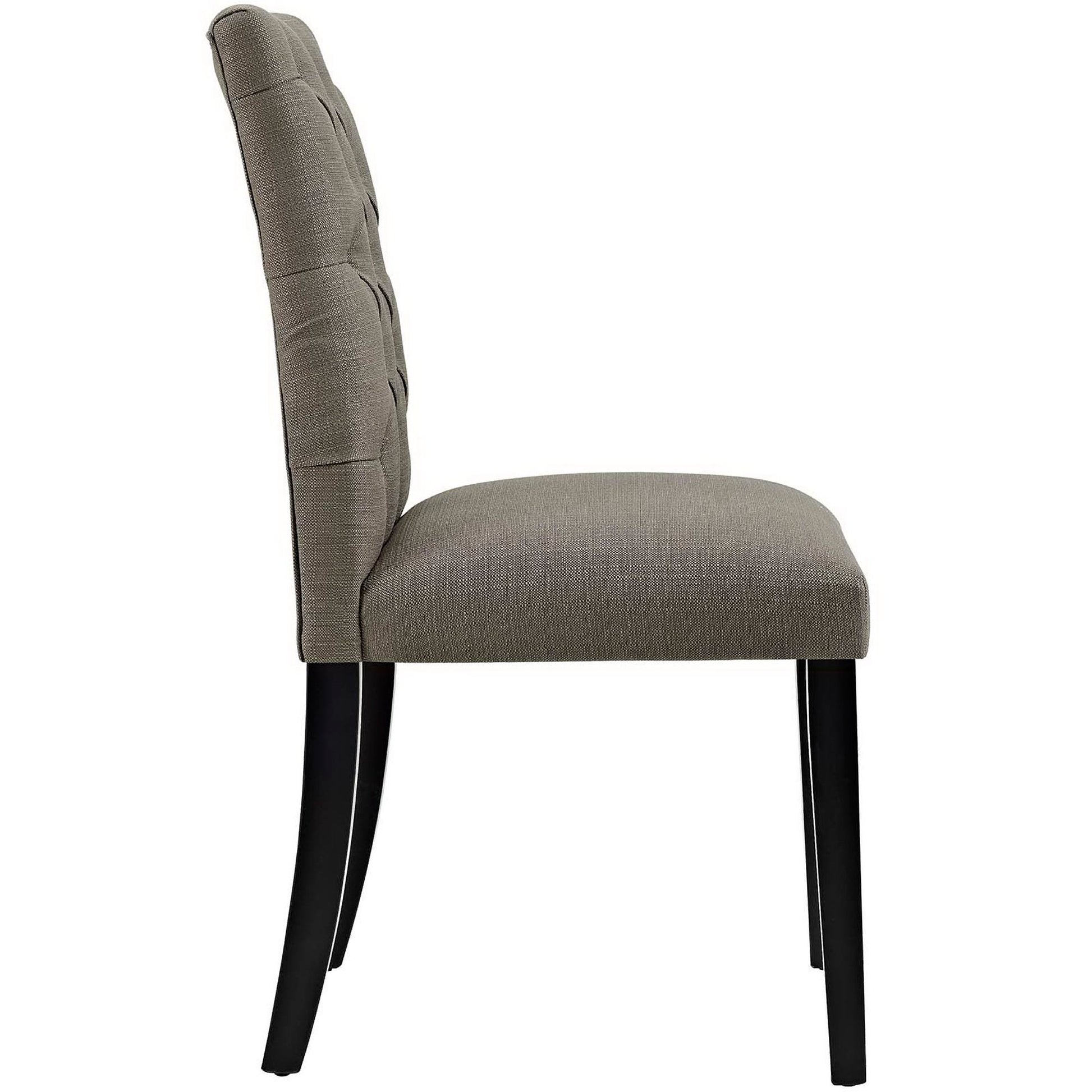 Taupe-gray upholstered dining chair with tufted back, cushioned seat and black tapered wooden legs.