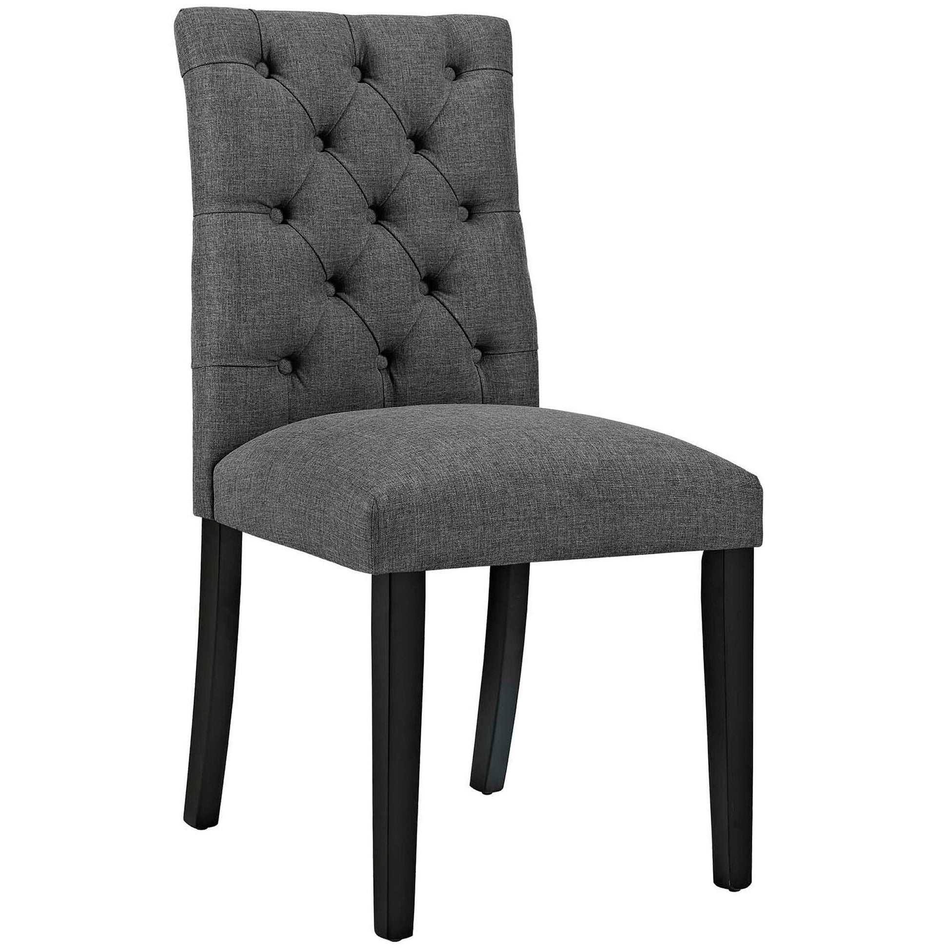 Gray upholstered dining chair with tufted back, cushioned seat, and black tapered legs.