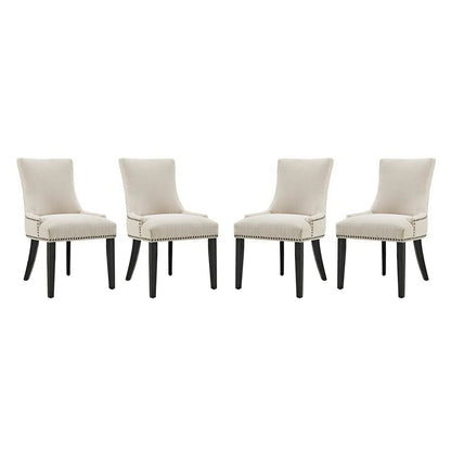 Set of four brown upholstered dining chairs with curved backs, nailhead trim, and dark wood tapered legs.