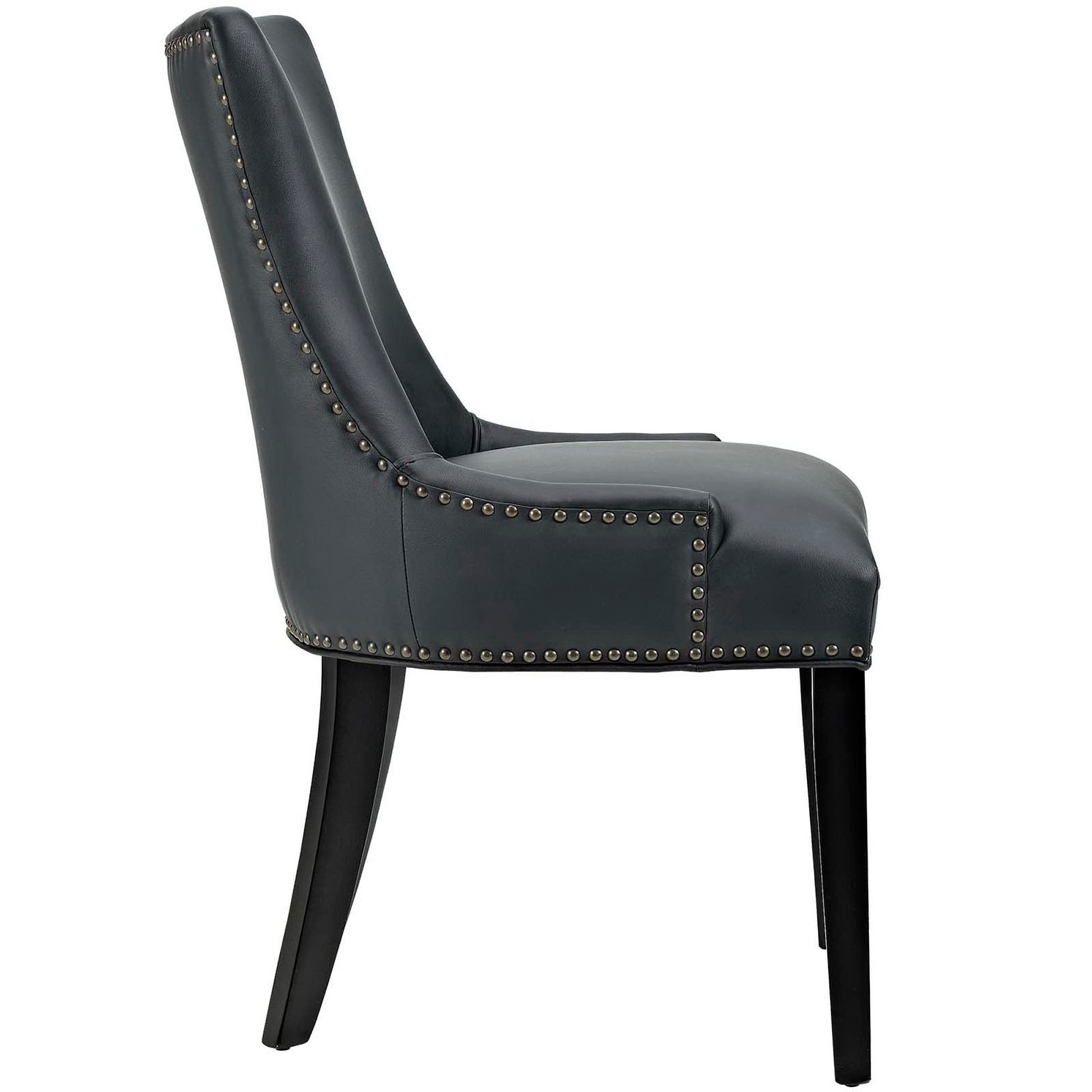 Charcoal faux leather dining chair with nailhead trim and curved back, black legs.