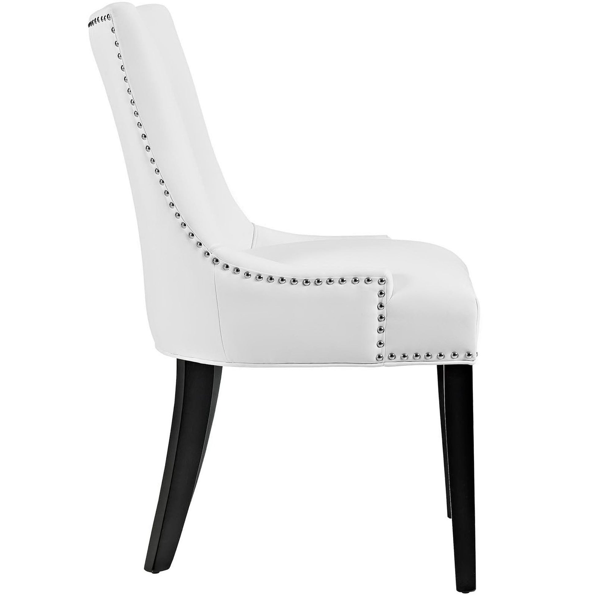 White faux leather dining chair with nailhead trim, curved back and padded seat, black legs.