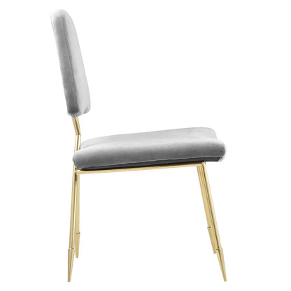 Grey velvet dining chair with gold metal legs, cushioned seat and tall backrest, contemporary design.