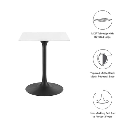 White 24" square wood dining table with a beveled-edge tabletop supported by a black tapered pedestal base; includes floor-protecting felt pads.