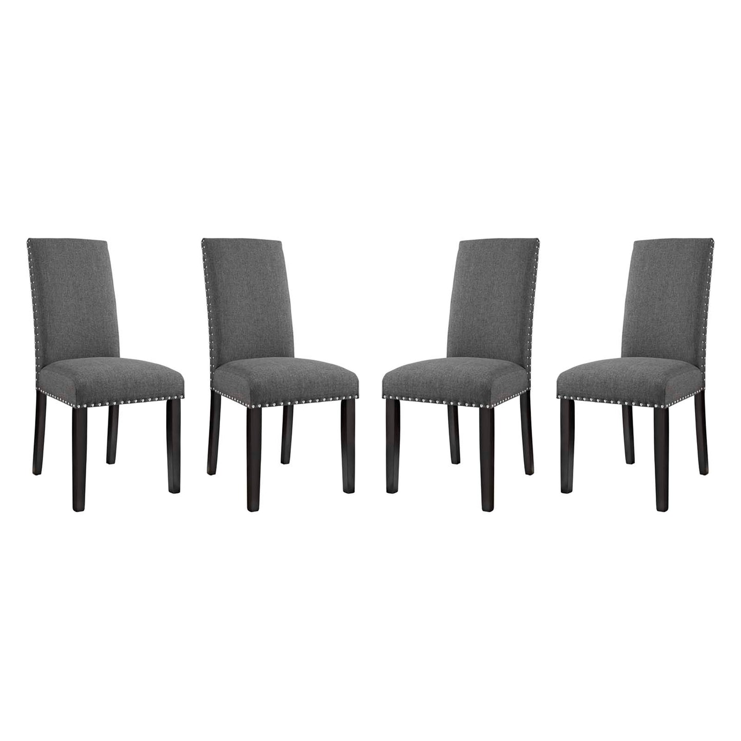Set of four grey upholstered dining chairs with nailhead trim & dark wood legs.