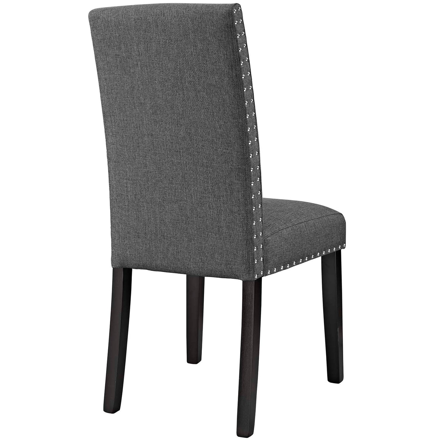 Gray upholstered dining side chair with high back, nailhead trim, and dark wood legs.