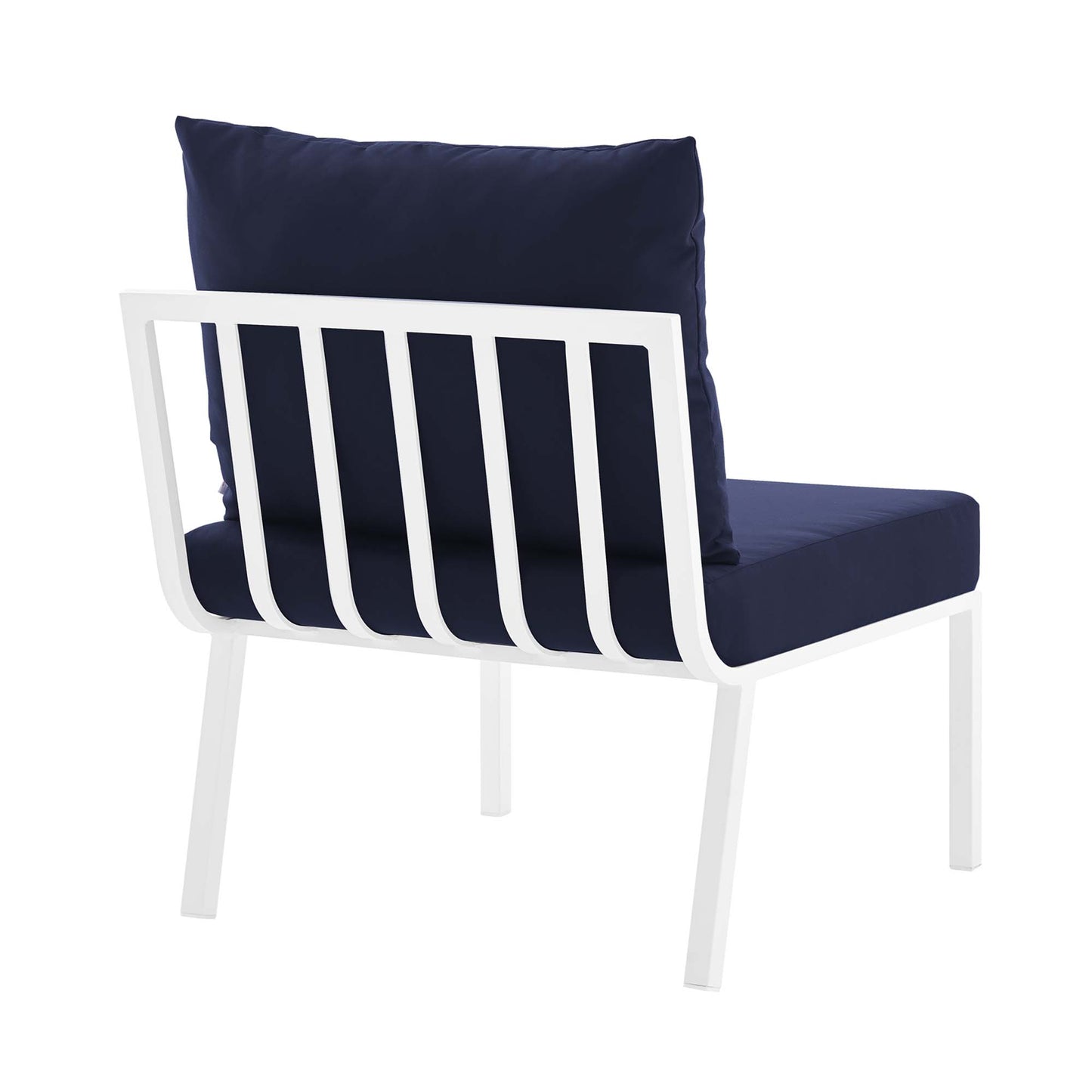 White aluminum armless outdoor chair with navy cushions and a vertical slat back, modern outdoor seating.