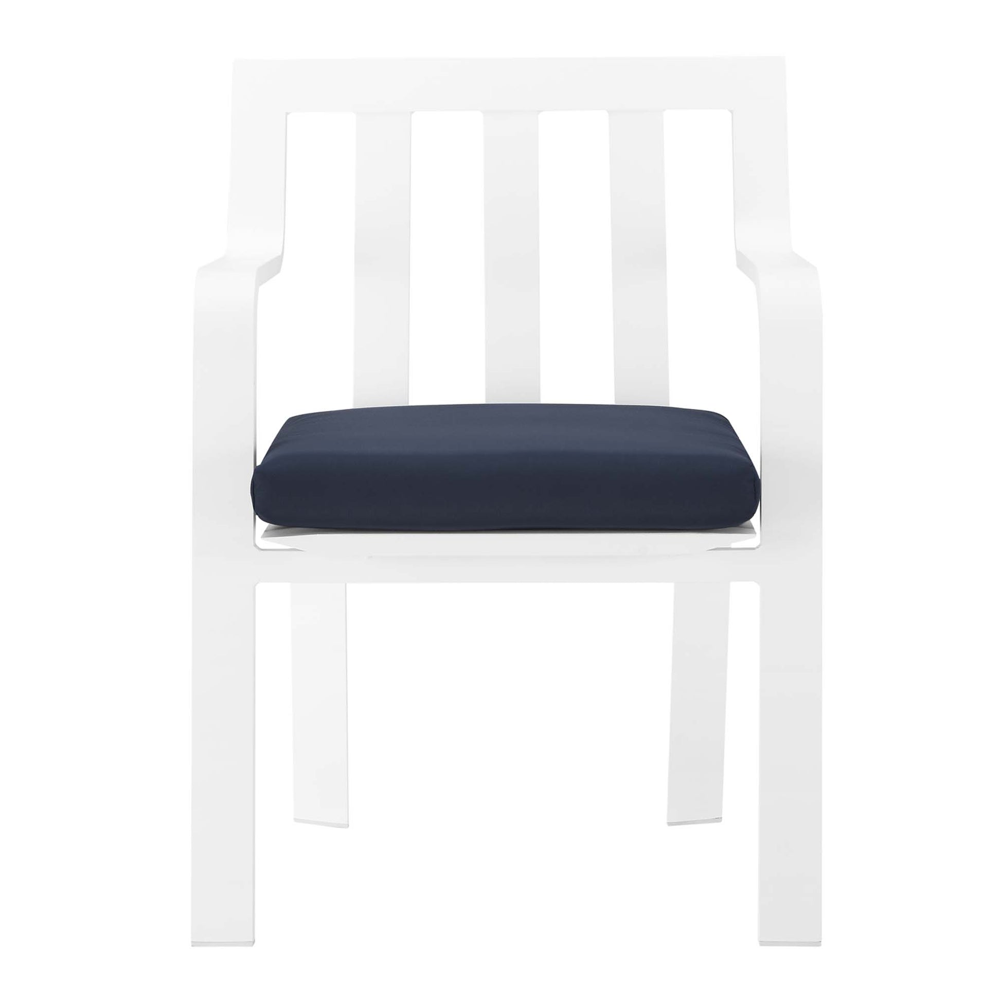 White modern outdoor patio aluminum dining armchair with navy cushion, slatted back and straight-frame legs.