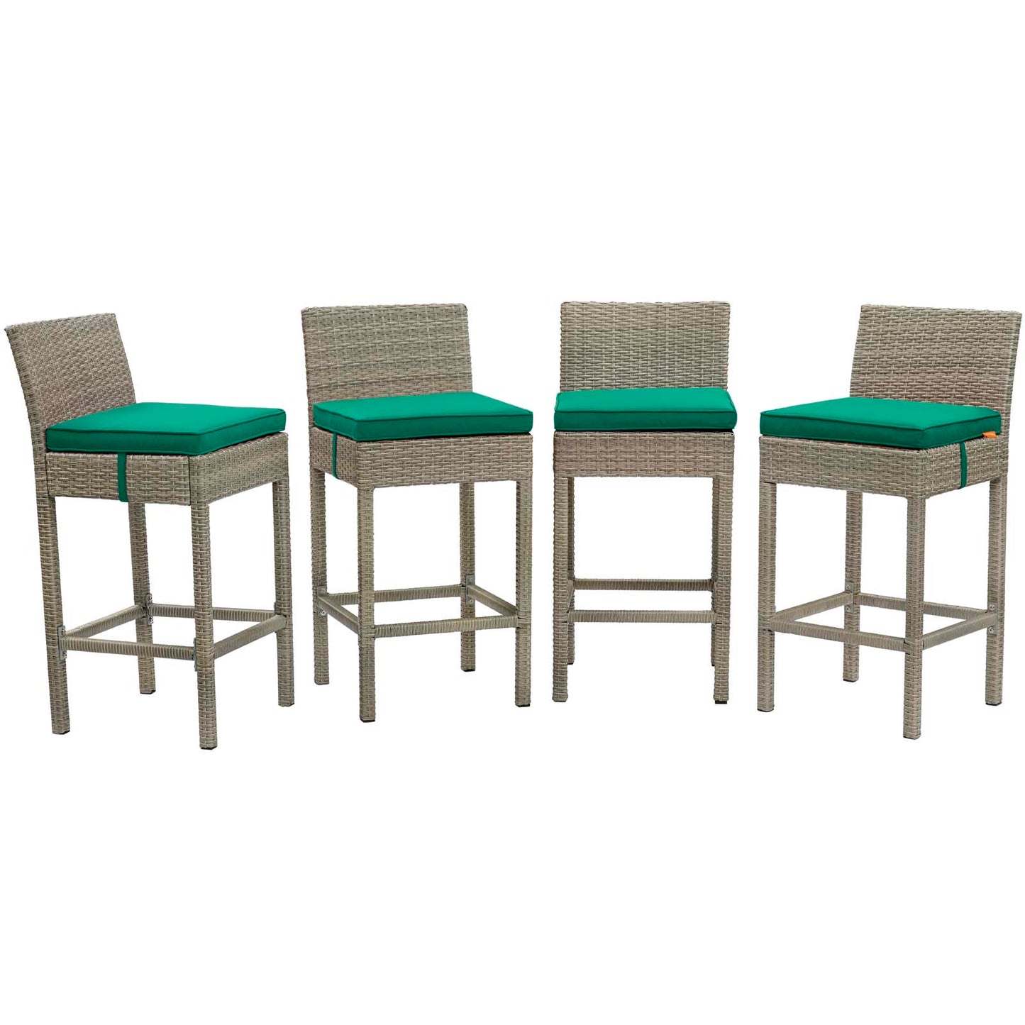 Set of four bar stools with beige wicker frames and teal cushions and footrests for outdoor seating.