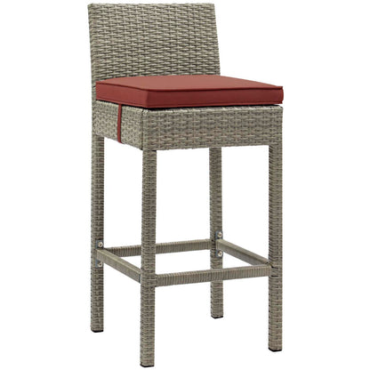 Set of 2 outdoor wicker rattan bar stools with light gray frames and currant cushions, high backs, and footrests for patio use.
