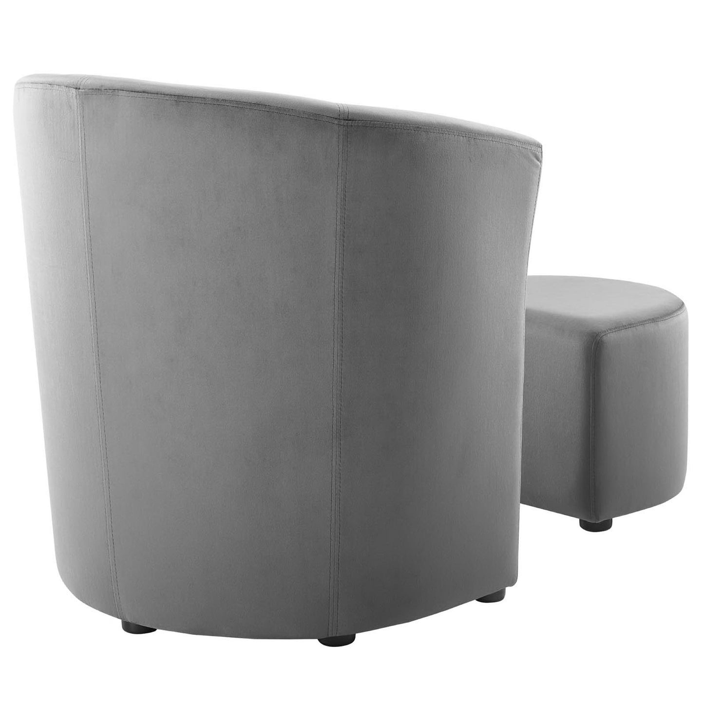 Grey velvet curved barrel chair with matching ottoman; plush contemporary living room seating.