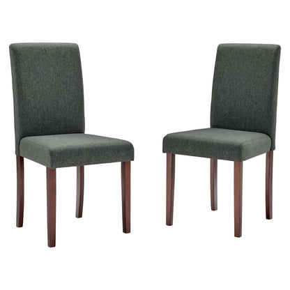 Pair of grey upholstered dining chairs with tall backs & dark wood legs.