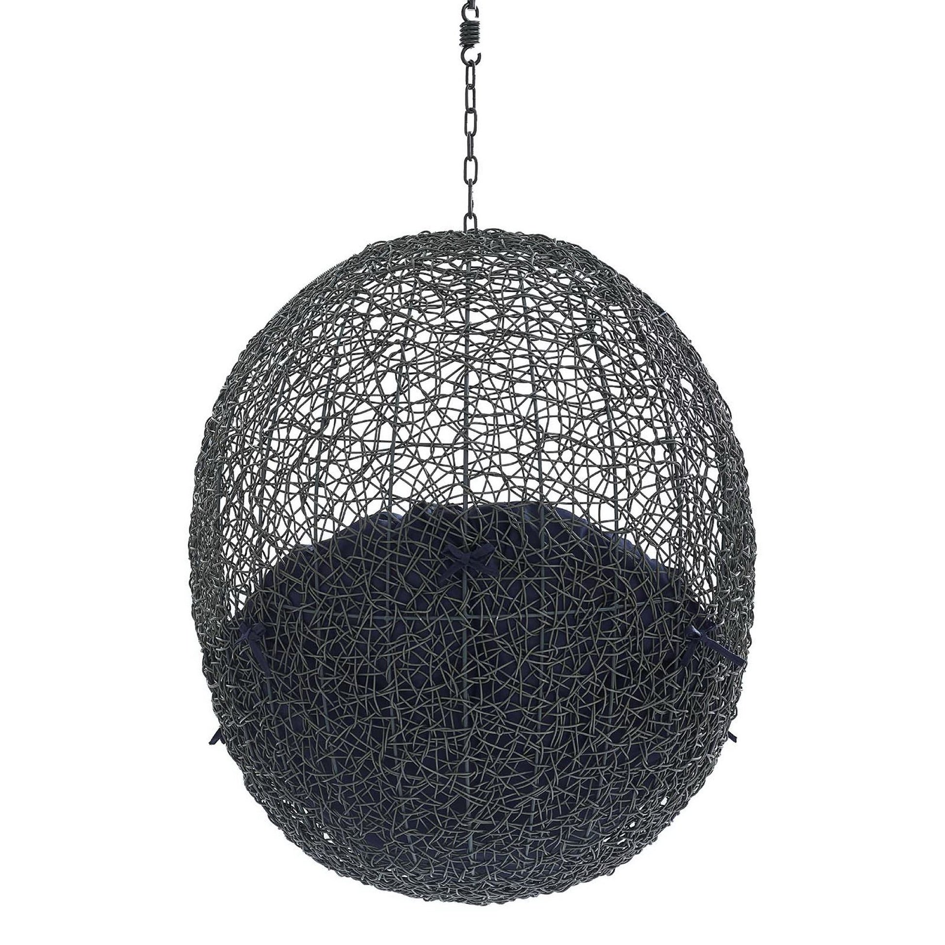 Gray spherical hanging chair with an open wire lattice and a navy cushion, suspended by a metal chain