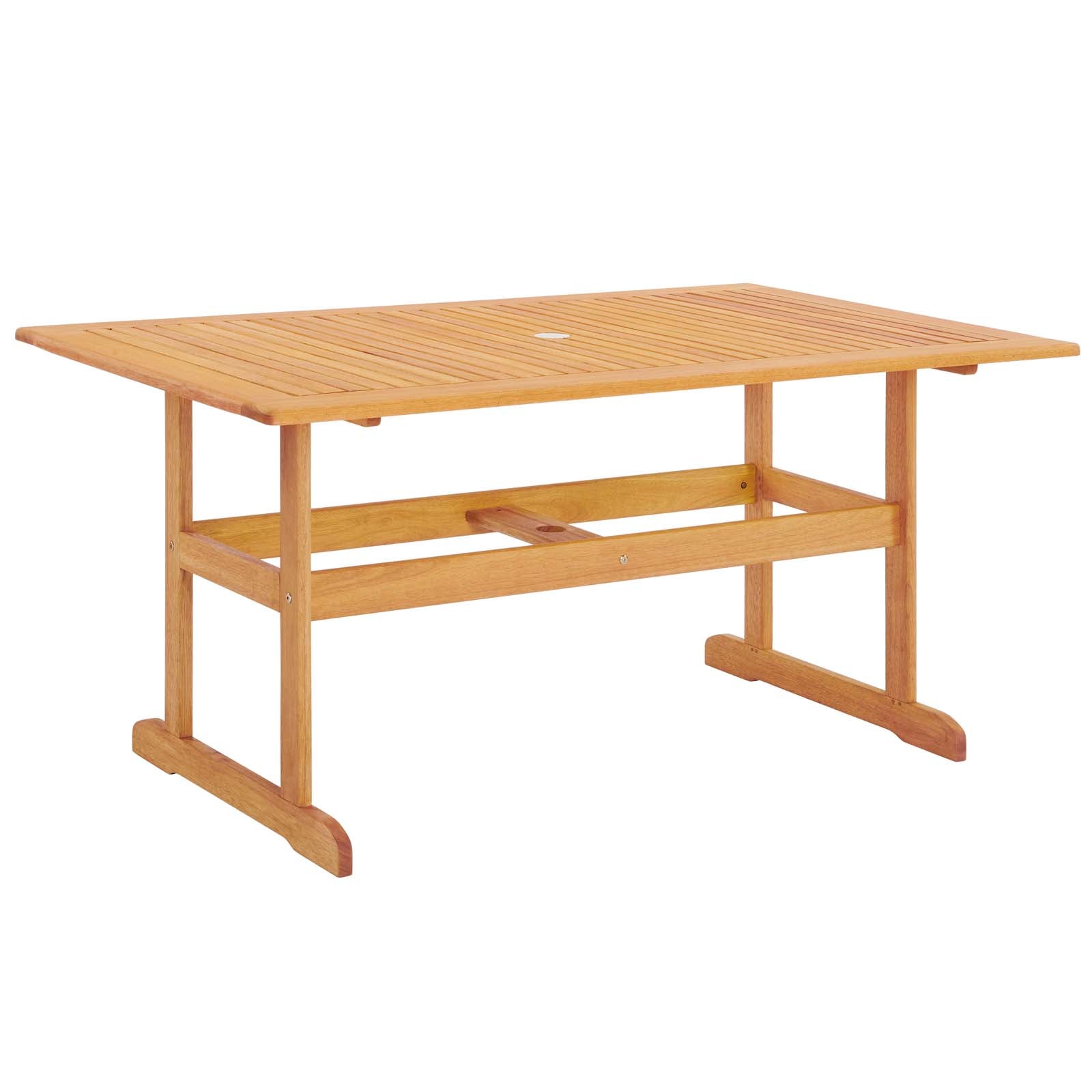 Natural eucalyptus wood outdoor dining table with slatted top, umbrella hole, and trestle legs with lower crossbar.