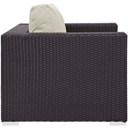 Dark espresso wicker outdoor 5-piece patio set with beige cushions and a fire pit.