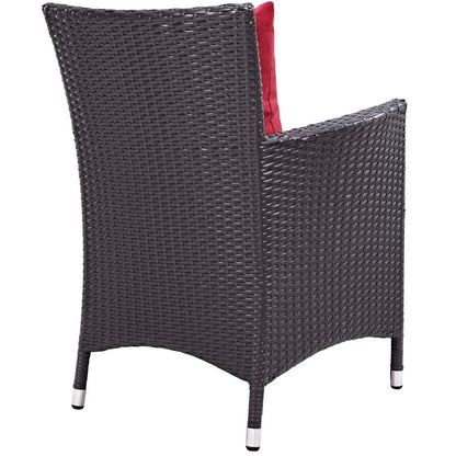 Dark brown woven wicker outdoor 3-piece patio set with red cushions and metal-tipped legs; includes a fire pit.