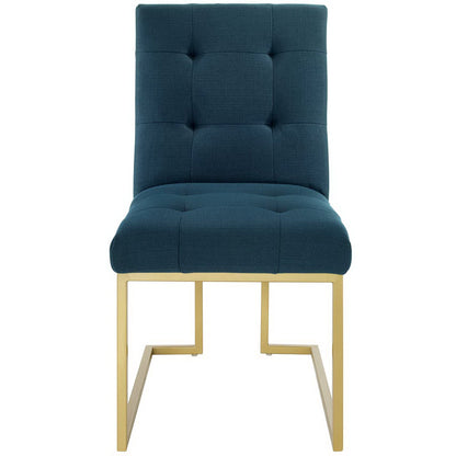 Azure blue tufted dining chair with gold-tone metal cantilever frame, contemporary style.