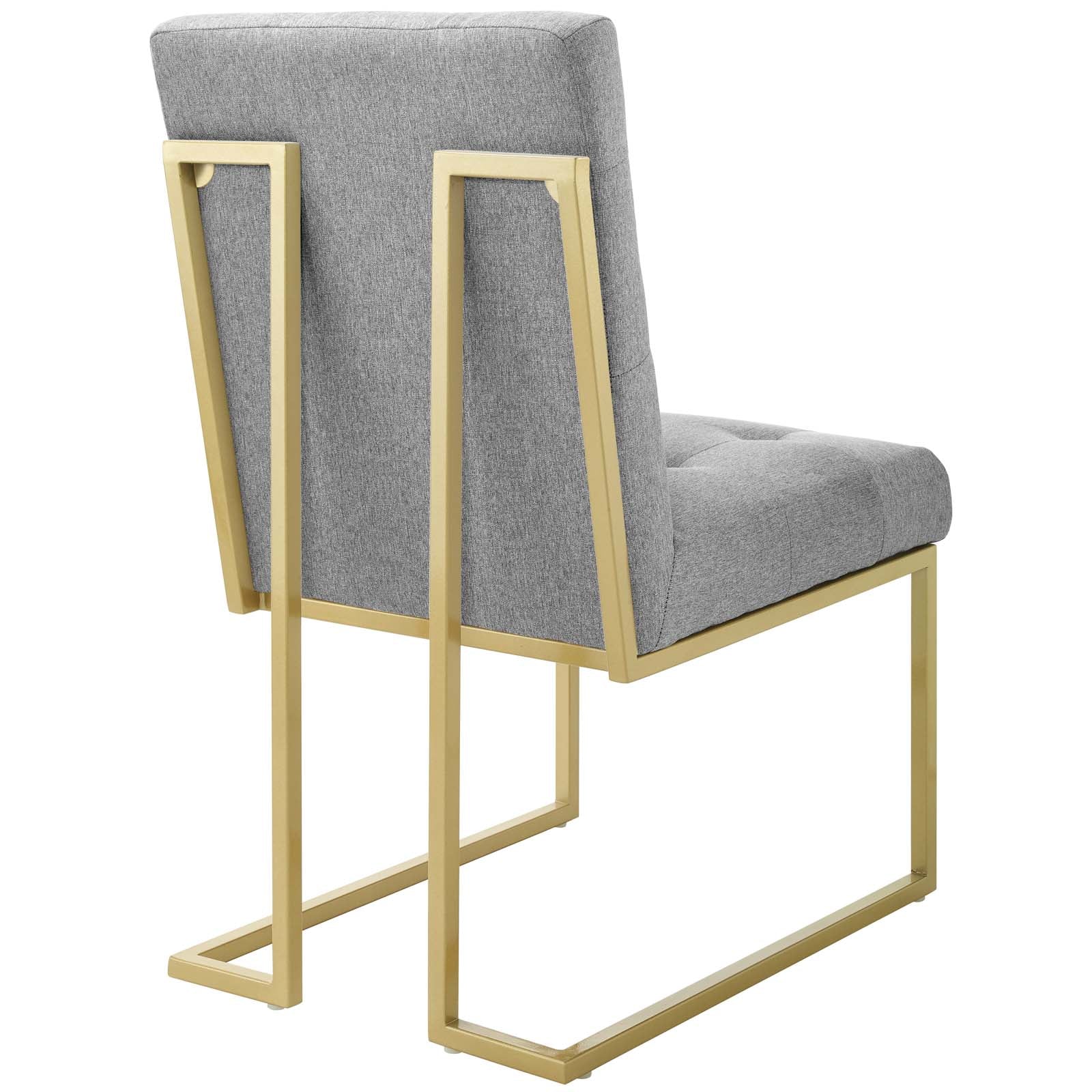 Gold stainless steel frame dining accent chair with light gray upholstered fabric seat and back.