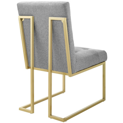 Gold stainless steel frame dining accent chair with light gray upholstered fabric seat and back.