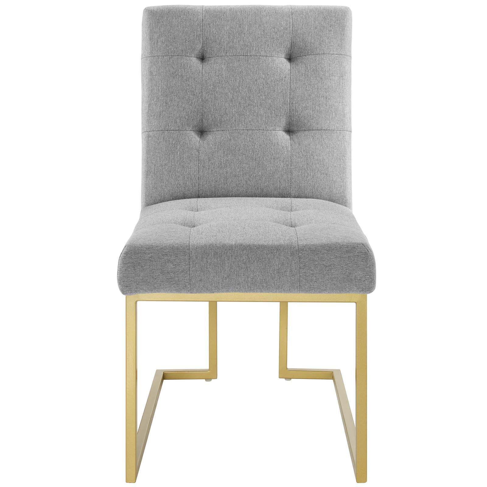 Light gray tufted dining chair with gold stainless steel legs forming a square frame.