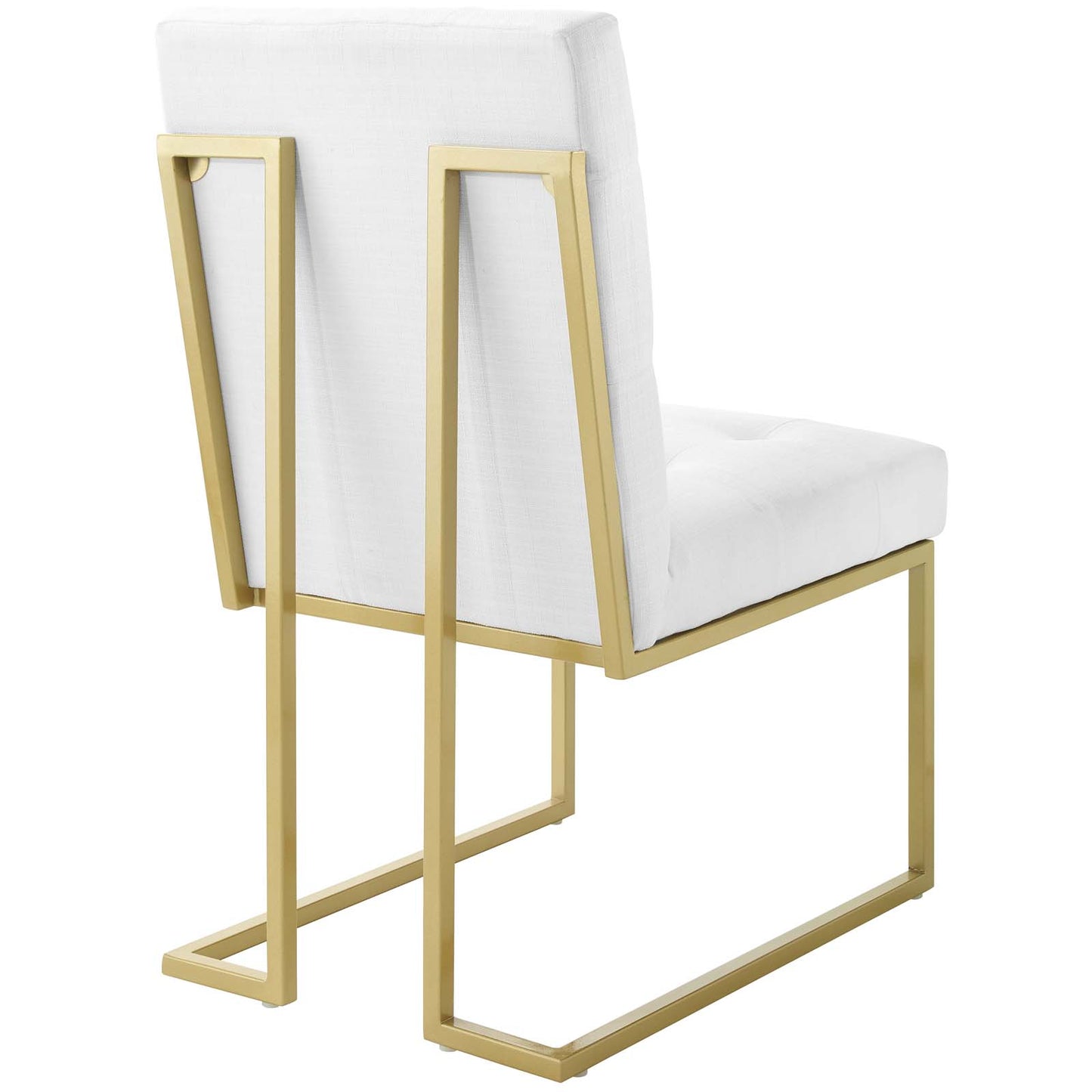 Gold-tone metal frame cantilever chair with white upholstered seat and back cushions, modern geometric style.