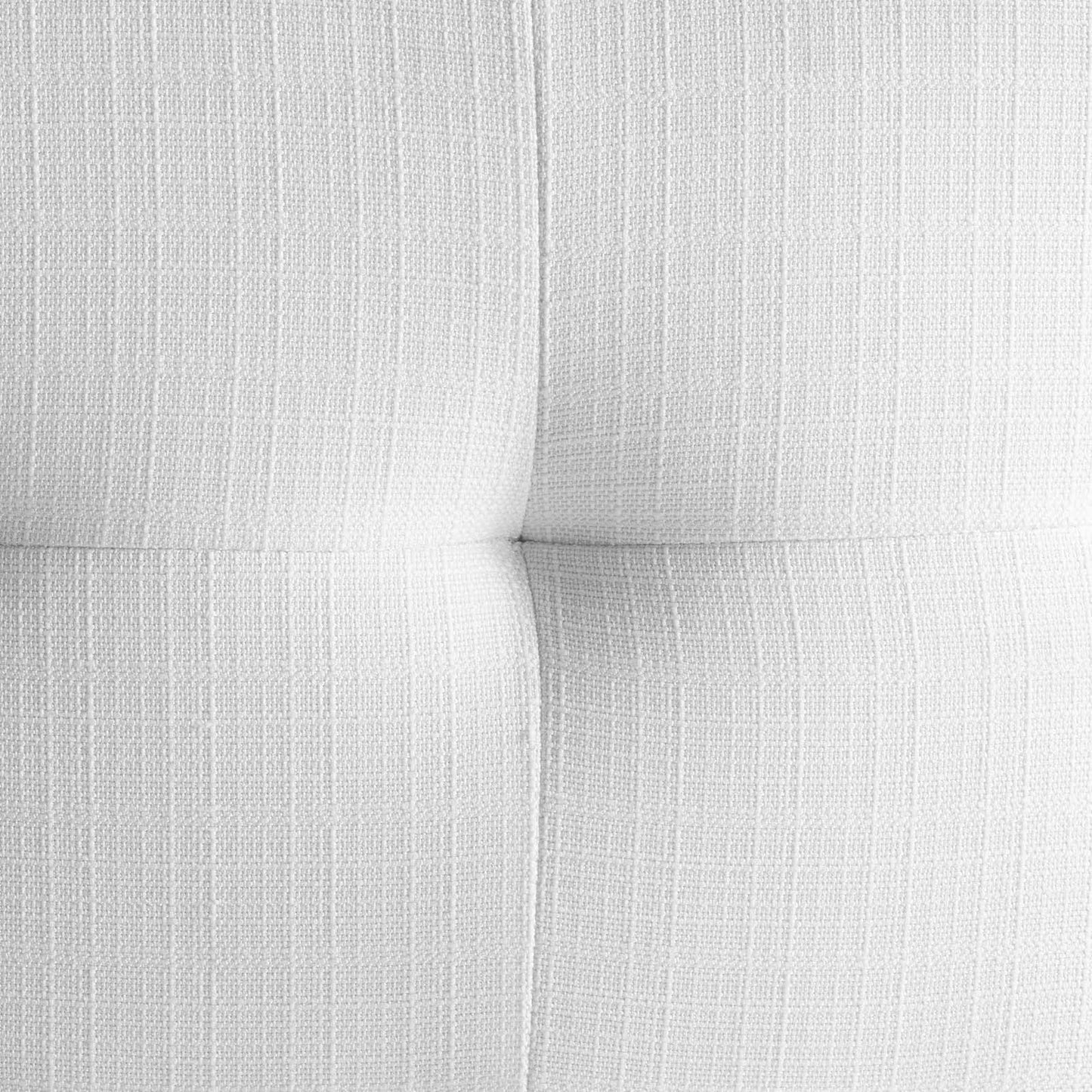 White tufted fabric upholstery close-up with textured weave and subtle vertical lines.
