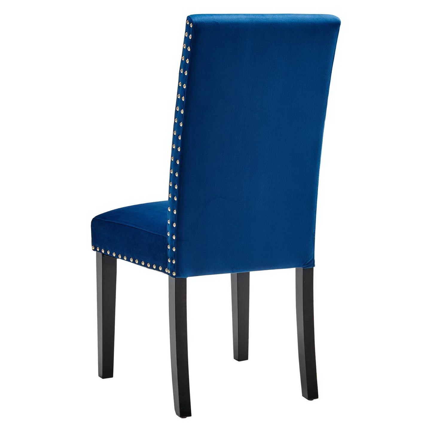 Blue velvet dining chairs with tall backs, nailhead trim along edges, dark wood tapered legs.