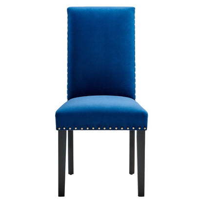 Blue upholstered dining chairs with tall backs, dark legs, and nailhead trim along the seat edge.