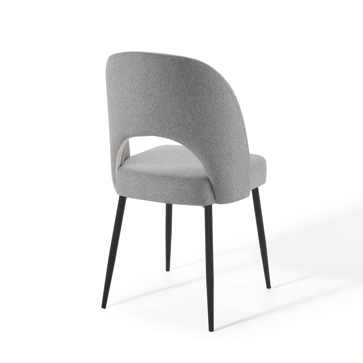 Light gray fabric upholstered dining chair with curved back & arm wrap, black tapered metal legs.